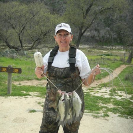 Rhonda Redden holding up fish
